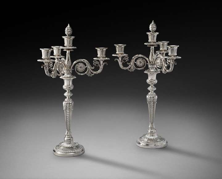 A Magnificent Pair of George III Silver Four-Light Candelabra